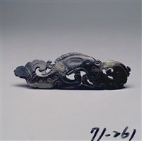 藏品(白玉魚尾龍形珮)的圖片