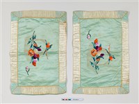 藏品(藍緞繡花籃枕套組)的圖片