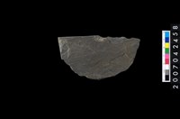 藏品(石環製作材料-中央帶啄痕打製圓板)的圖片