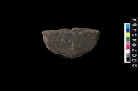 藏品(石環製作材料-中央帶啄痕打製圓板)的圖片