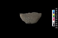 藏品(石環製作材料-中央帶啄痕打製圓板)的圖片