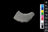 藏品(石環製作材料-旋截圓環粗胚殘件)的圖片