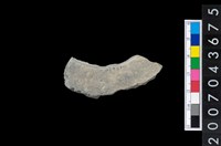 藏品(石環製作材料-旋截圓環粗胚殘件)的圖片