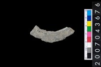 藏品(石環製作材料-旋截圓環粗胚殘件)的圖片