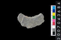 藏品(石環製作材料-旋截圓環粗胚殘件)的圖片