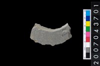 藏品(石環製作材料-旋截圓環粗胚殘件)的圖片