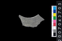 藏品(石環製作材料-旋截圓環粗胚殘件)的圖片