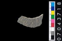藏品(石環製作材料-旋截圓環粗胚殘件)的圖片