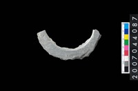 藏品(石環製作材料-旋截圓環粗胚殘件)的圖片