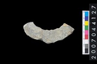 藏品(石環製作材料-旋截圓環粗胚殘件)的圖片