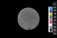 藏品(石環製作廢料-旋截圓核)的圖片