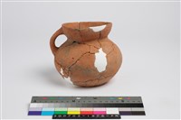 藏品(侈口帶流圓腹凹底附加單把罐)的圖片