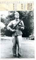 藏品(雲南人民反共志願軍擄獲共軍第十三軍三十九師一一七團團部一等兵及其武器)的圖片