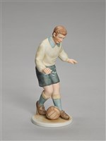 藏品(足球球員踢球)的圖片