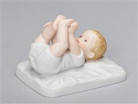 藏品(男孩玩腳/仰躺)的圖片