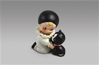 藏品(黑帽系列：/跪姿/抱貓)的圖片