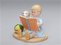 藏品(和狗狗一同看書的小朋友)的圖片