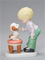 藏品(小孩與狗握手)的圖片