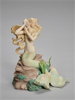 藏品(岩石上的美人魚)的圖片