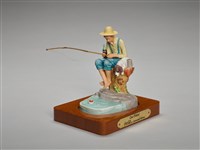 藏品(釣魚少年(可口可樂百年廣告紀念品))的圖片