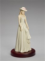 藏品(配戴飾滿花朵寬沿圓帽仕女)的圖片