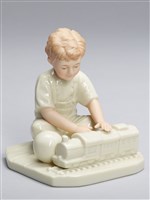 藏品(玩火車的小男孩)的圖片