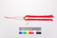 白底黃花紋提花緞布元寶香包藏品圖，第2張