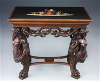 鑲嵌寶石桌面的胡桃木桌的圖片