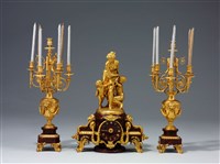 鍍金青銅座鐘與燭台組合的圖片