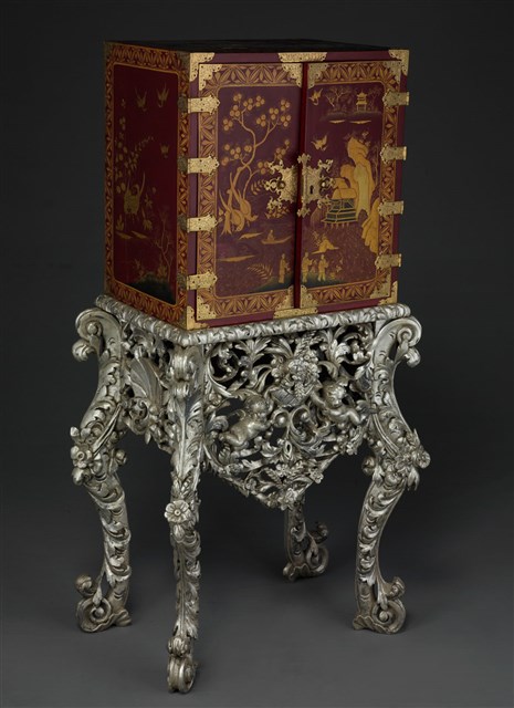 A Charles II Period Red and Gilded-Japanned Cabinet on a Silvered Stand