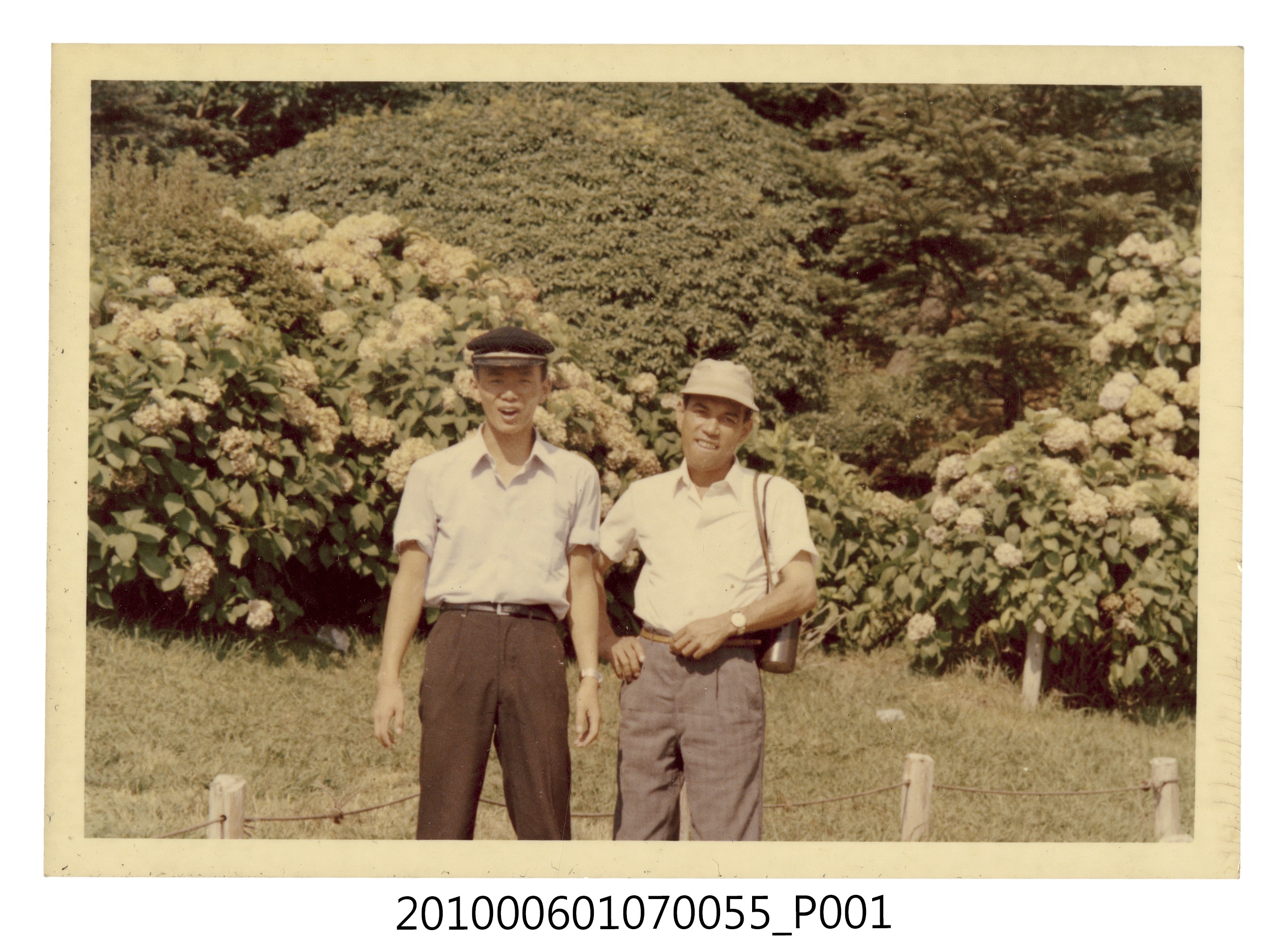 唯岡氏及其兒子合照 (共2張)