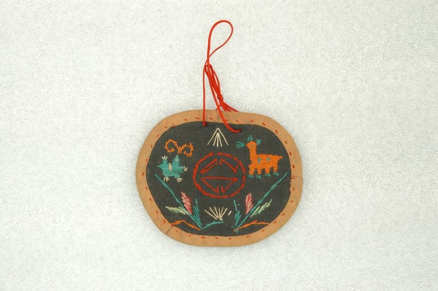 龜鹿紋腰圓煙袋 (共5張)