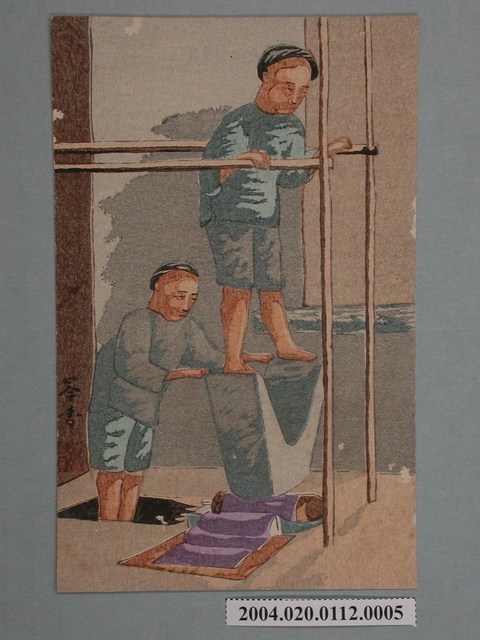 男子踩踏碾布石 (共3張)