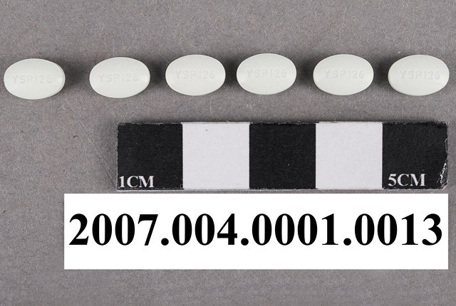 橢圓形淡綠色YSP126字樣藥錠