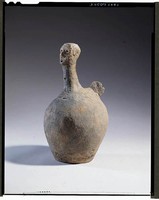 Gray earthenware vessel.in the shape of a person.  Collection Image, Figure 2, Total 4 Figures