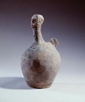 Gray earthenware vessel.in the shape of a person.  Collection Image, Figure 1, Total 4 Figures