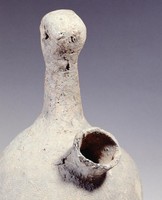 Gray earthenware vessel.in the shape of a person.  Collection Image, Figure 4, Total 4 Figures