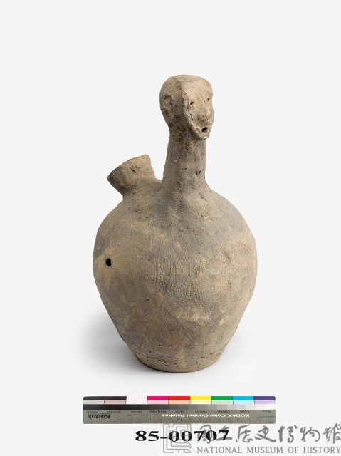 Gray earthenware vessel.in the shape of a person.  Collection Image, Figure 3, Total 4 Figures