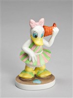 復古迪士尼 海灘上的黛西鴨和大貝殼的圖片