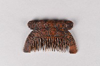 浮雕五人面紋木梳藏品圖，第1張