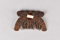 浮雕五人面紋木梳藏品圖，第2張