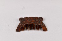 浮雕五人面紋木梳藏品圖，第3張