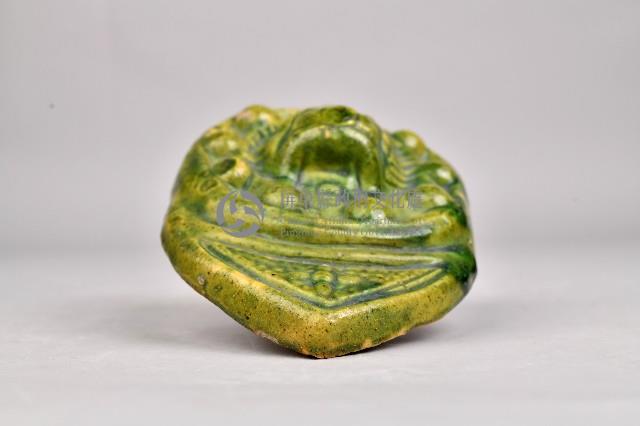 綠釉獅面水滴型陶製瓦當藏品圖，第1張