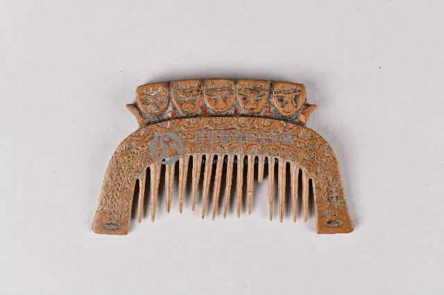 人面幾何紋木製梳藏品圖，第1張