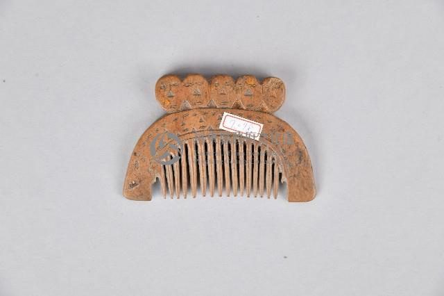 人面木製梳藏品圖，第2張