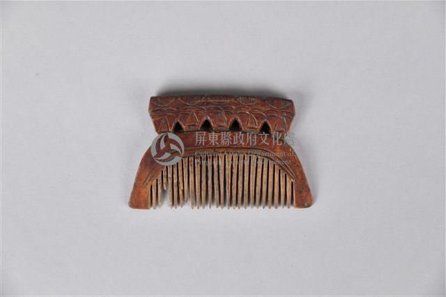 人面木製梳藏品圖，第1張