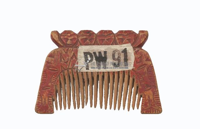 排灣族木製人形刻紋梳藏品圖，第1張