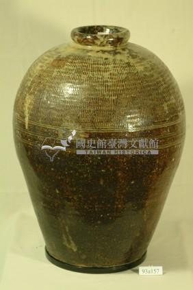 帶款深棕褐釉拍打印紋窄口豐肩式陶甕藏品圖，第1張