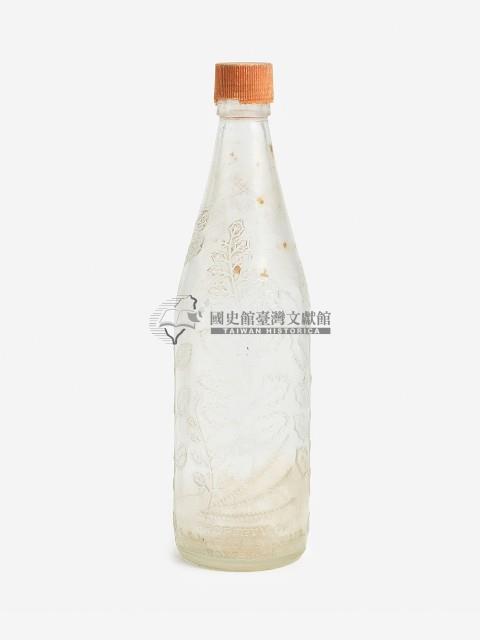 橘色瓶蓋直頸浮雕花草紋玻璃瓶藏品圖，第1張