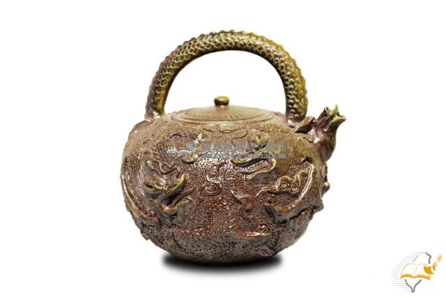 陶製貼飾龍紋提梁壺藏品圖，第1張